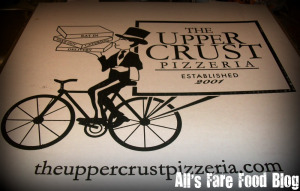 Upper Crust pizza box.