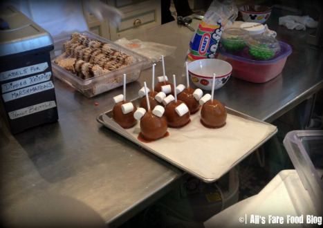 Preparing candy apples at Magic Kingdom