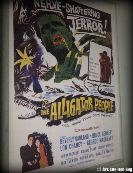 Movie posters lining the walls of Sci-Fi Dine-In Theater