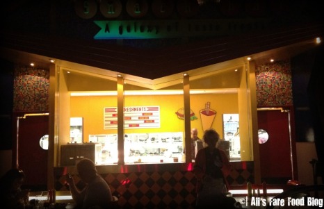 The kitchen looks like a snack shop at Sci-Fi Dine-in Theater