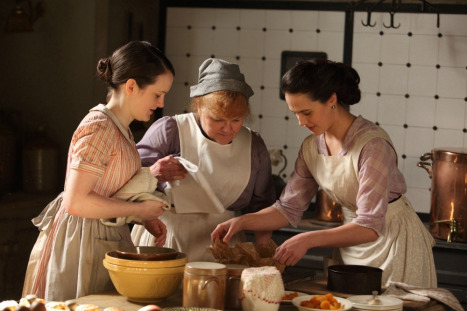 Shown from L-R: Sophie McShera as Daisy, Lesley Nicol as Mrs. Patmore, Jessica Brown-Findlay as Lady Sybil