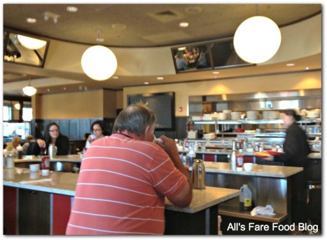 Sitting at the counter at Red's Kitchen and Tavern