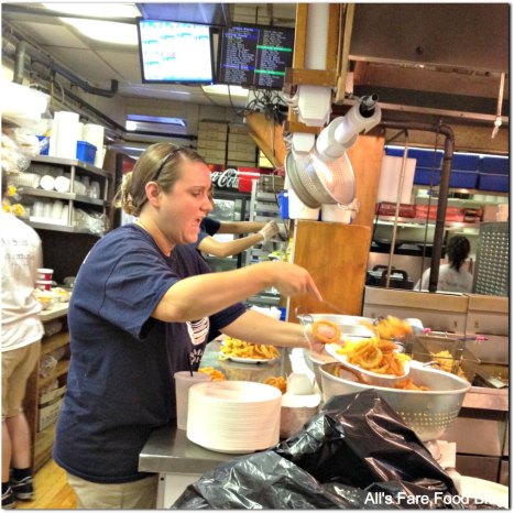 Serving up onion rings at Woodman's of Essex